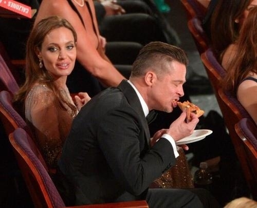 And we witnessed Brad Pitt chomping down on some pizza: